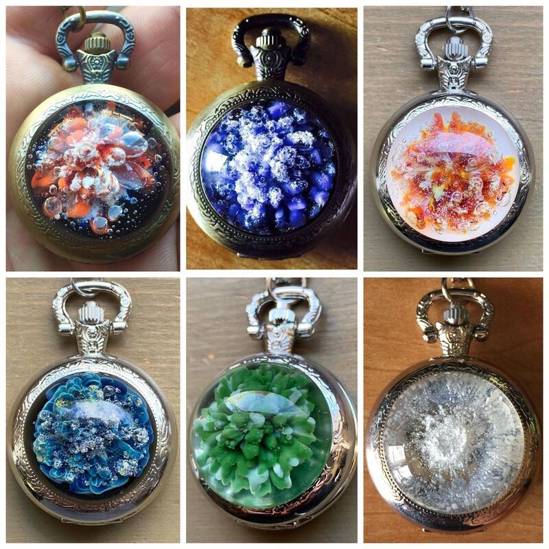 A composite photo of 6 colorful memorial glass pocket watches made using cremation ash
